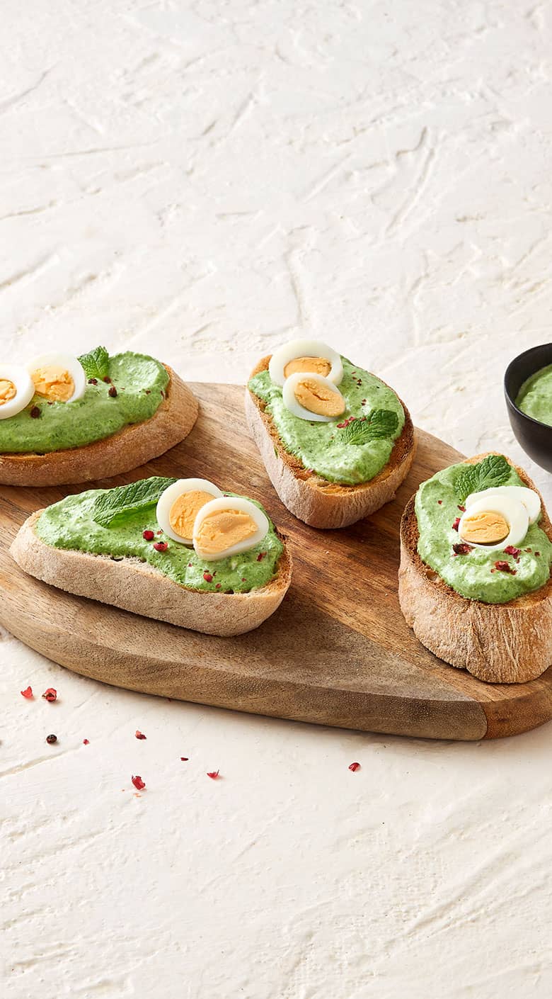 Bruschetta de espinafres e queijo creme