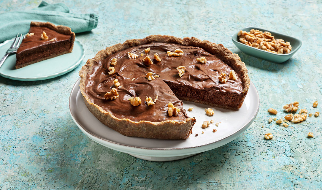 Fatia e tarte de chocolate e noz